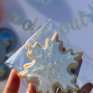 Winter snowflake cookie with gold accents - elegant decorated cookie