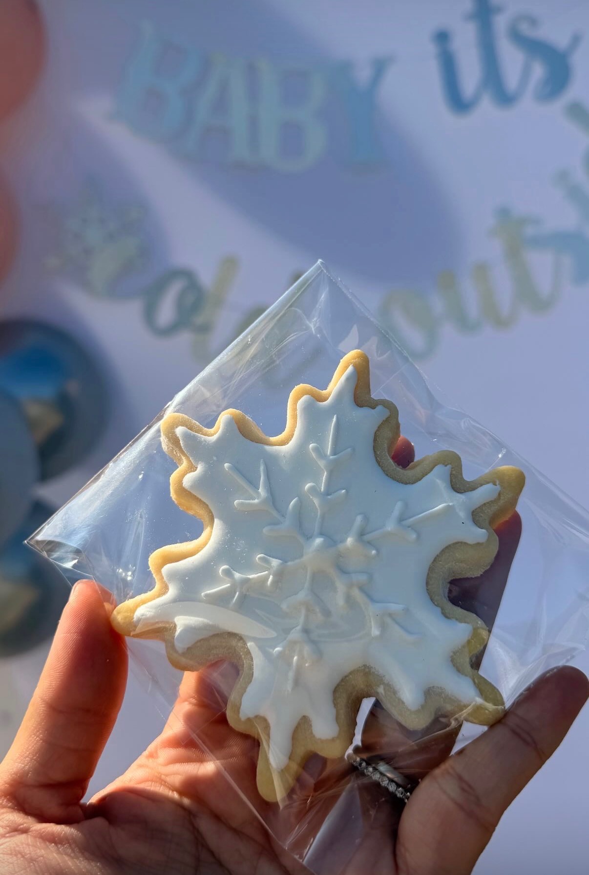 Winter snowflake cookie with gold accents - elegant decorated cookie